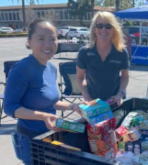 Partner Wayne Louvier and Senior Attorney Jennie Park helped packed 1700 boxes of food for distribution to OC Food Bank 20220312