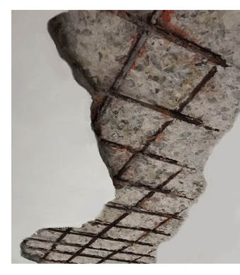 Spalling concrete from rusting rebar. 